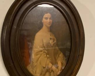 Vintage lady in lovely oval wooden frame