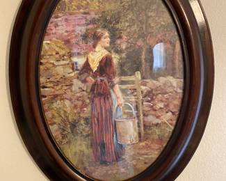 Oval framed portrait under glass