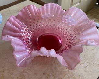 Close up of the pink ruffle edge Fenton bowl