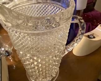 Pitcher and tape holder