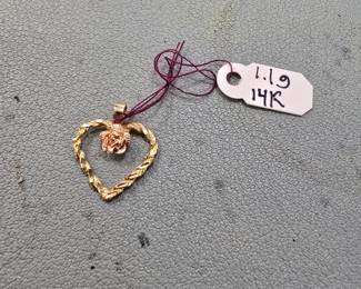 14 karat gold pendant.