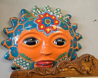 Large terracotta sun