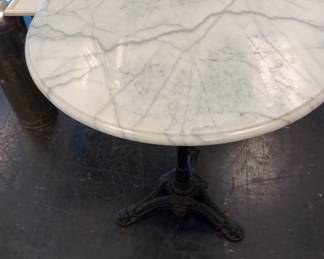 marble top iron bottom table