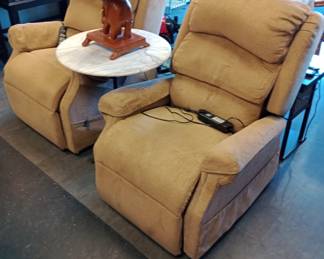 matching lift chairs and marble top table and a cute elephant table