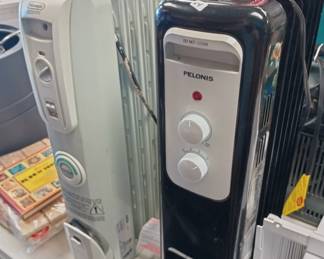 two nice floor heaters very clean on wheels