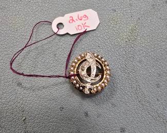 10 karat gold brooch. shriner