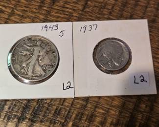 Standing liberty silver half dollar and a Buffalo nickel