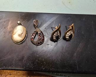 Sterling silver earrings and pendants.