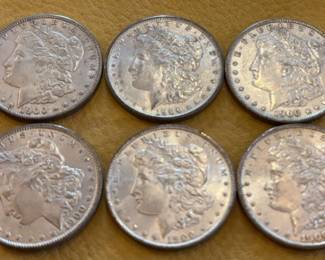 Six 1900 Date Morgan Dollars