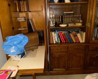 Wall unit for a sewing machine table