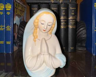 Praying woman statue