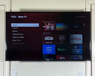 50” TCL FLATSCREEN TV | 50” TACL flat screen Roku TV - w. 25 x l. 43.5 in