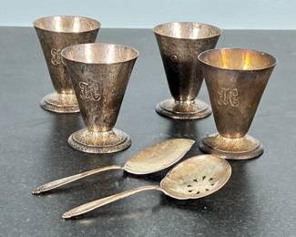 (6pc) STERLING SILVER ITEMS | Including: 4 hammered sterling silver cups engraved with letter "H" and marked on bottom "STERLING" (7 ozt.) and 2 small Prelude sterling silver spoons marked "International Sterling" (1.4 ozt.) Total weight: 8.5 ozt. - h. 3 x dia. 2.25 in