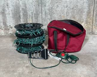 CHRISTMAS LIGHTS | 3 spools of white LED Christmas lights with outdoor extension cord and carrying case.