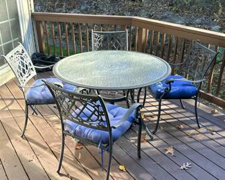 (5pc) OUTDOOR PATIO SET | Including: 4 cast aluminum with grated back and scroll curved arms, round glass top table with curved legs and umbrella holder - h. 28 x dia. 48 in (table)