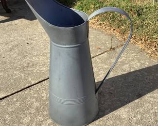 Galvanized pitcher yard decor
