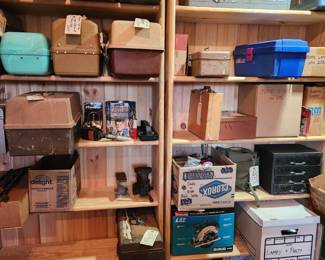 Tackle boxes and some art supplies. 