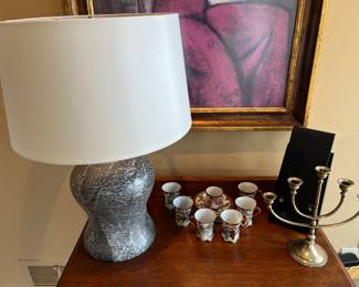 Nice selection of lighting; vintage Japanese hand-paintedcup and saucer set; vintage brass five-arm candelabra.