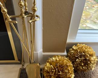 Set of brass fireplace tools.