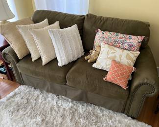 Upholstered loveseat hide-a-bed.