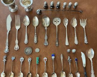 Sterling silver flatware, souvenir spoons, salt & pepper shakers, and more; two vintage silver U.S. coins.