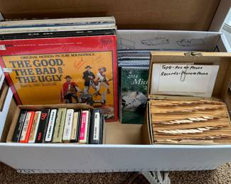 Vinyl LPs, 45 rpm records, and 8-track cartridges.