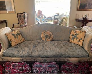 Chippendale style camel back elegant sofa. Requires new upholstery.