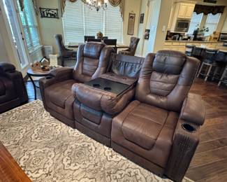 Middle console, cup holders, phone charger, pocket, etc