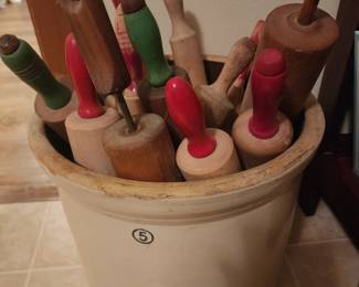 Large collection of rolling pins in a #5 crock