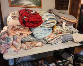 Bedding including spreads, blankets, comforters, and sheet sets