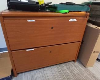 several two drawer wooden lateral file cabinets