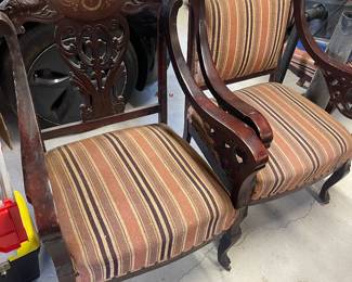 Pair heavily carved antique arm chairs