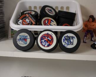 Hockey pucks - some signed