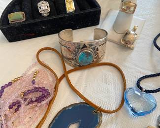 Baccarat heart necklace; Mexican silver cuff