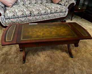 #5	Drop-leaf coffee table with leather top 35-51x20x16	 $45.00 
