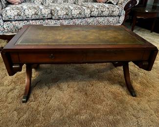 #5	Drop-leaf coffee table with leather top 35-51x20x16	 $45.00 
