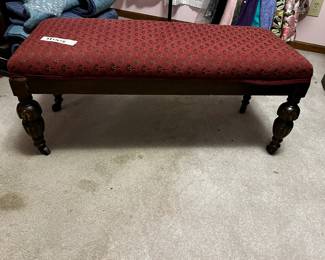 #17	Cushioned bench on wheels 38x16x16 (as-is one leg needs gluing)	 $35.00 

