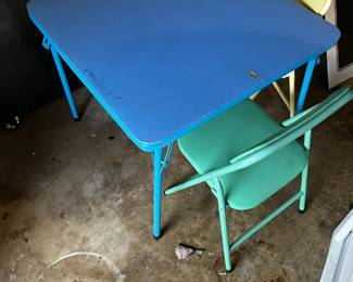 #63	Kids folding table with 2 folding chairs (as-is top)	 $40.00 
