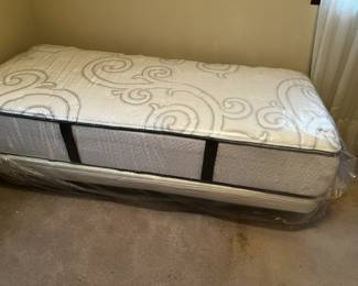 #21	Serta Twin bed with platform (mattress sealed in plastic)	 $150.00 

