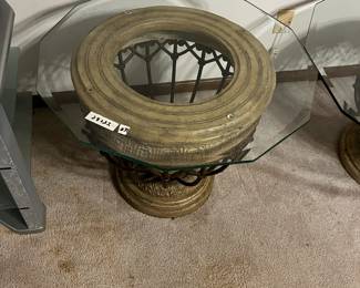 #31	Medium beveled glass top table with heavy metal and resin base 28x22	 $60.00 
