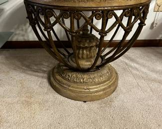 #31	Medium beveled glass top table with heavy metal and resin base 28x22	 $60.00 
