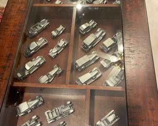 Vintage Danbury Mint Collectible Pewter cars. Coffee table has a lift glass top to display your collectibles 