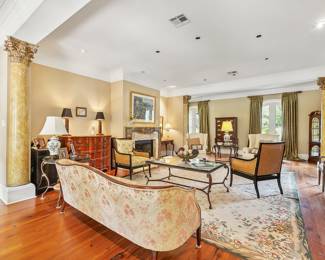 Hickory Chair Sheraton Sofa - 84” covered in Floral Velvet Fabric.  Sherrill Cane Back Chairs, Gold Stripe Seat Cushions, CTH 36” X 56” Metal Coffee Table with Glass Top