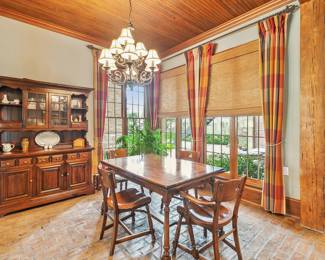 Rock Maple Table - expands with ends extending - as pictured above without extension table measures 36” X 54”.  Chairs are rock maple as well.  Kling Break Front with Glass Doors made of Dark Pine.