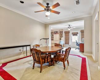 Border Rug; Octagon Game Table and Chairs with Brown Leather Cushions