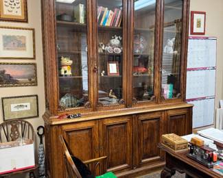 Monumental solid wood oak breakfront bookcase     
19th century with hand carved details                                                                                                                                                 111"h  x  90"w  x  19"d                                                                                            Break- away