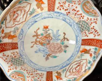 A fun cat on the antique Imari plate. great colors!