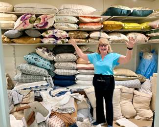DALE MAKING SENSE OF SO MANY UPSCALE LINENS AND PILLOWS.