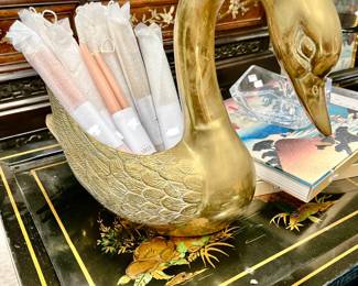 Pair of fabulous brass swans full of candles still in package.