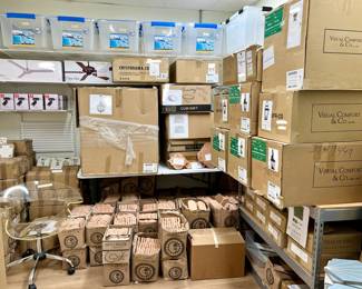 Room full of chandeliers, tile, hardware.